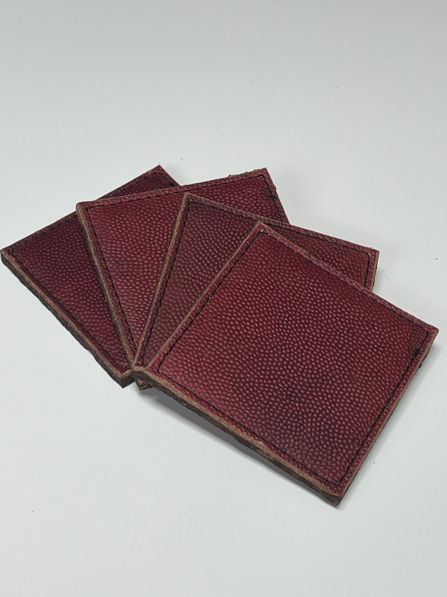 4 piece set of football leather coasters